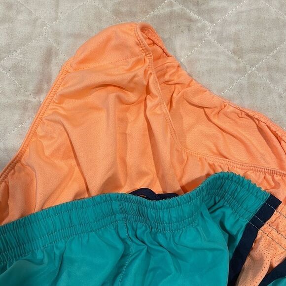 NIKE Teal and pale orange running shorts - Picture 4 of 4